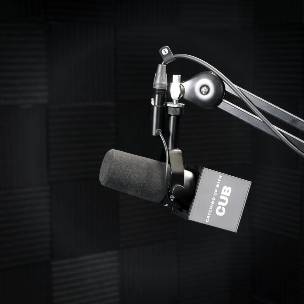 Branded Mic Cube reading Catching Up With CUB